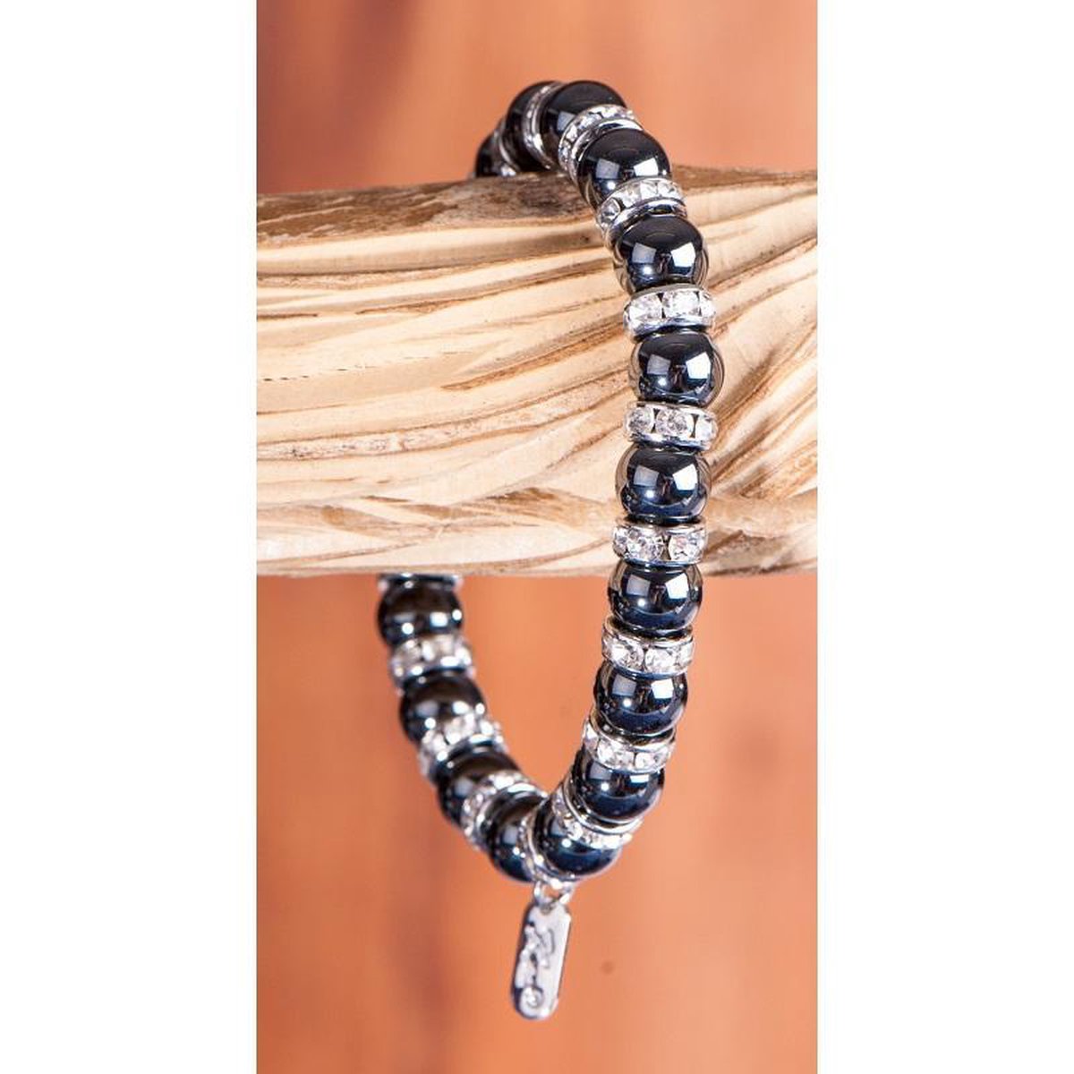 Magneet armband met witte kristal stenen