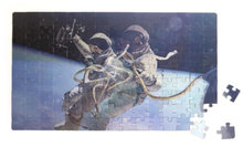 Kikkerland puzzel Motion Astronaut 24 x 42 cm karton 135-delig