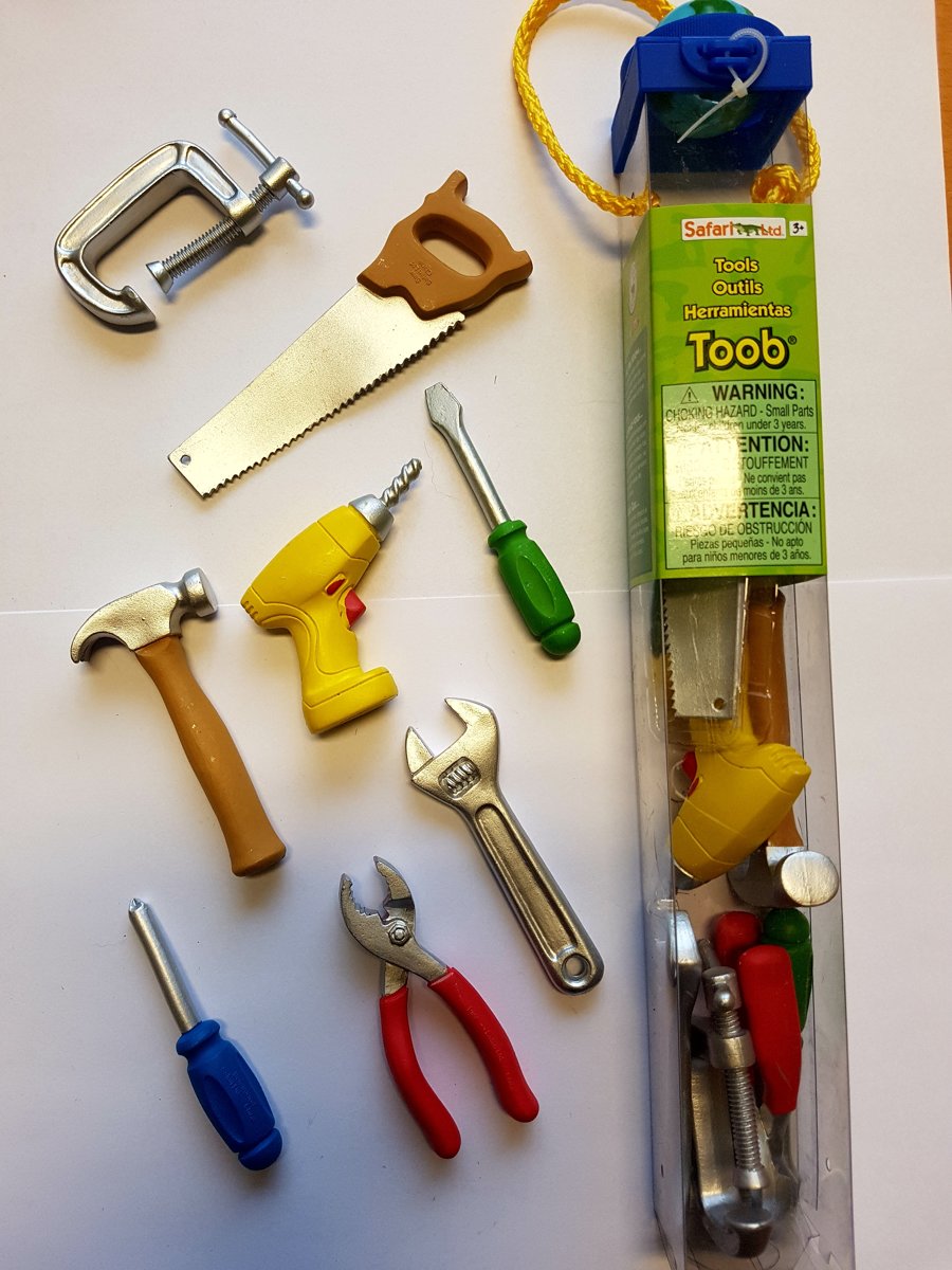 Tube met mini figuren gereedschap