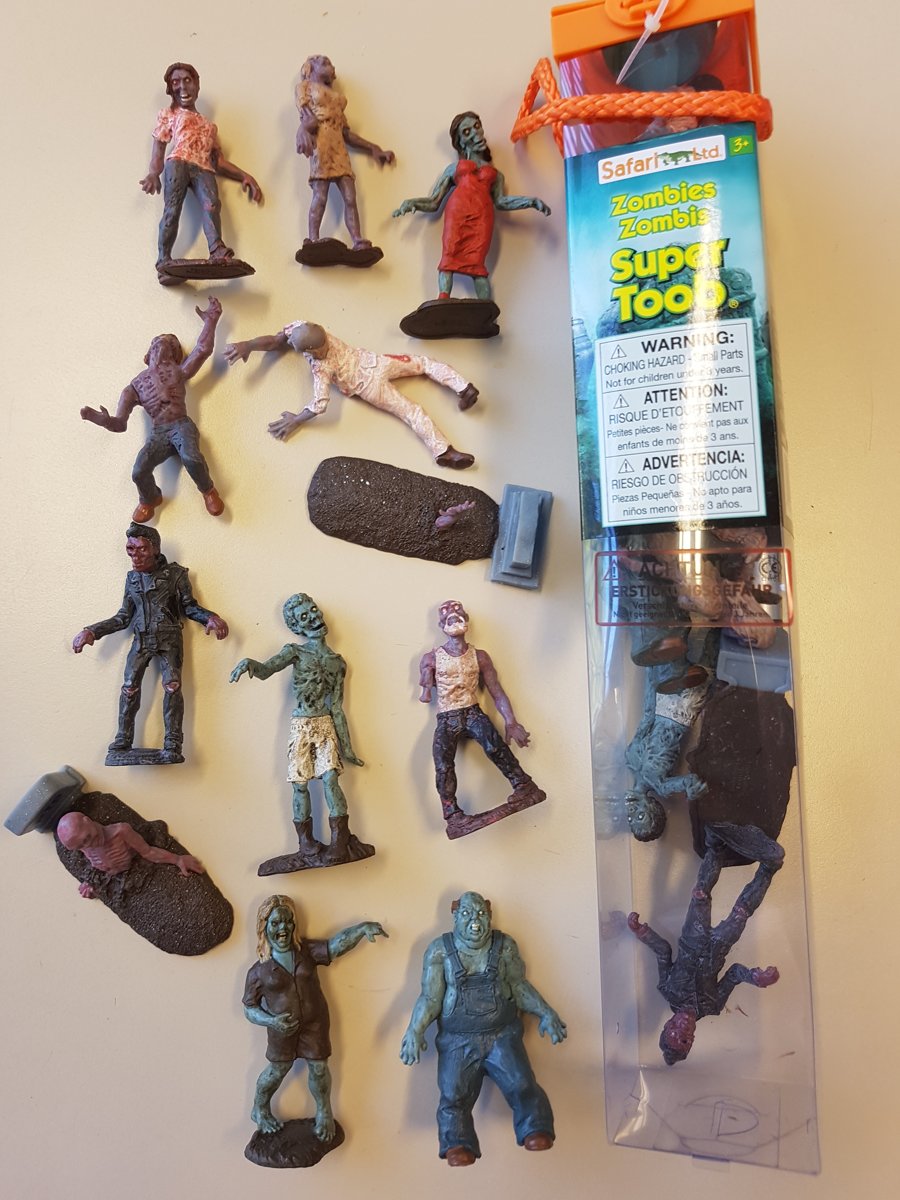 Tube met 12 mini figuren Zombies