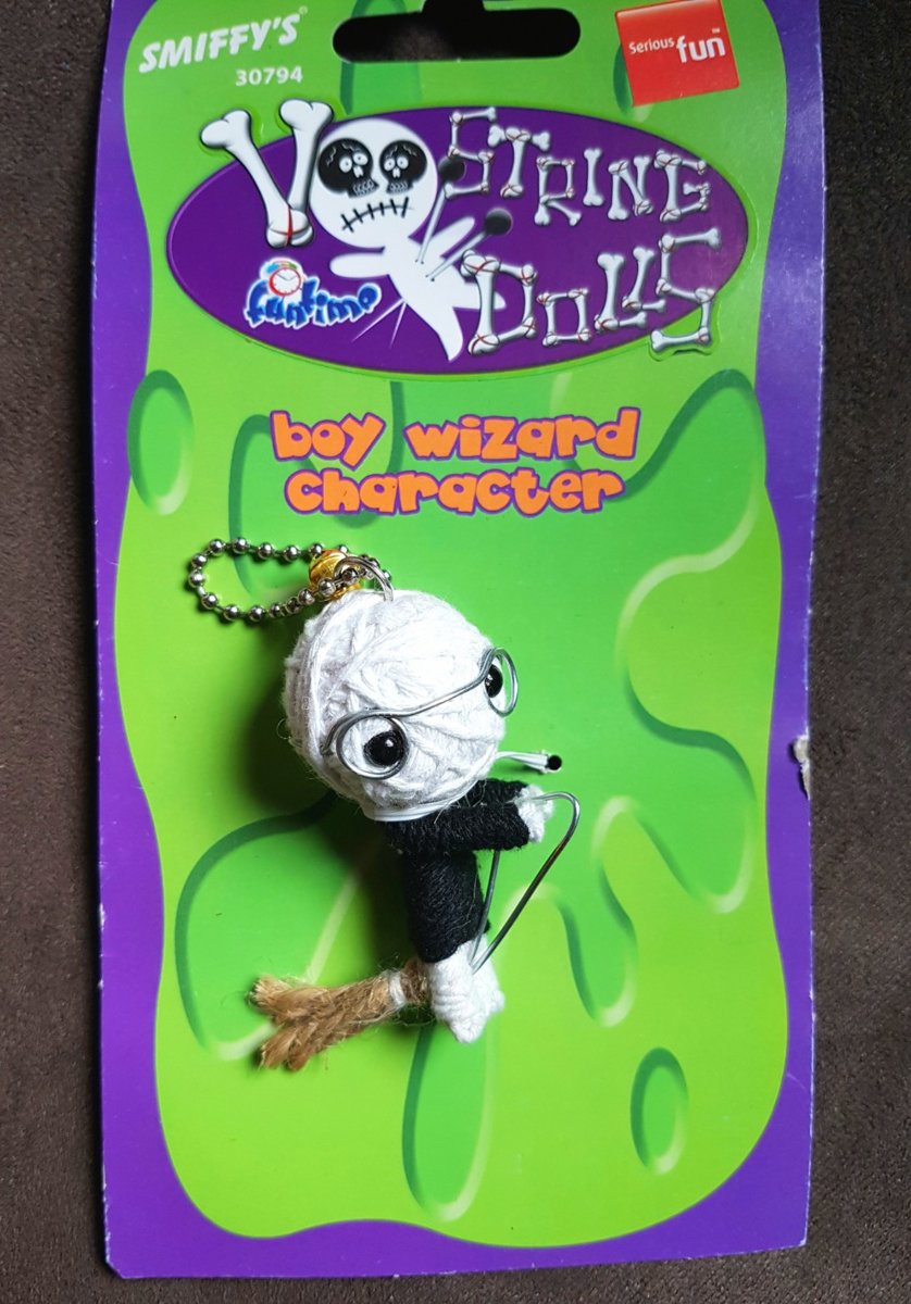   string voodoo dolls Boy wizard character