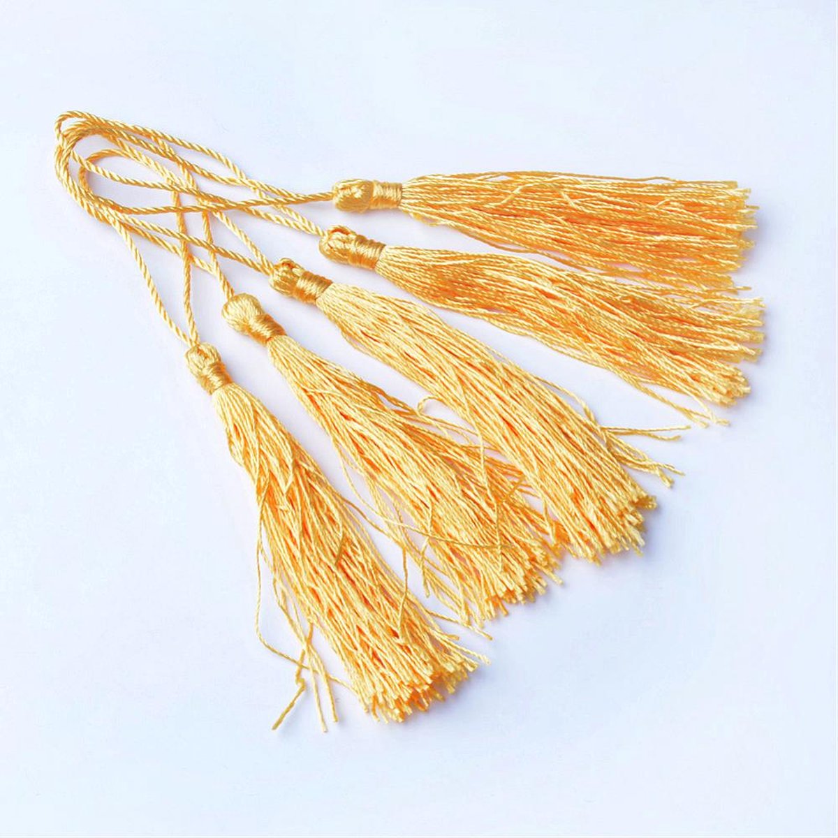 Tassels (kwastjes), 80x6mm (130mm met lus), licht oranjegoud, voor al uw creatieve ideeën. Verkocht per 50 stuks