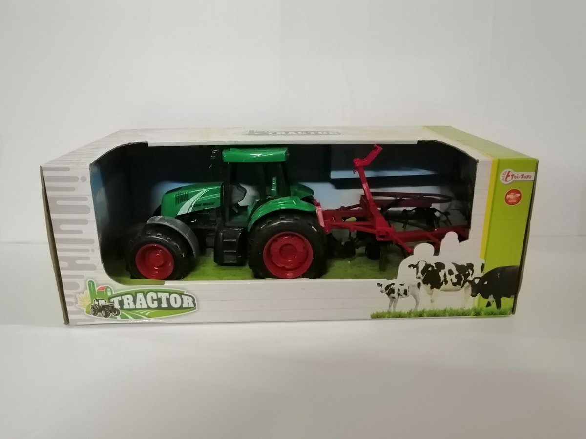 Frictie tractor met aanhanger in doos